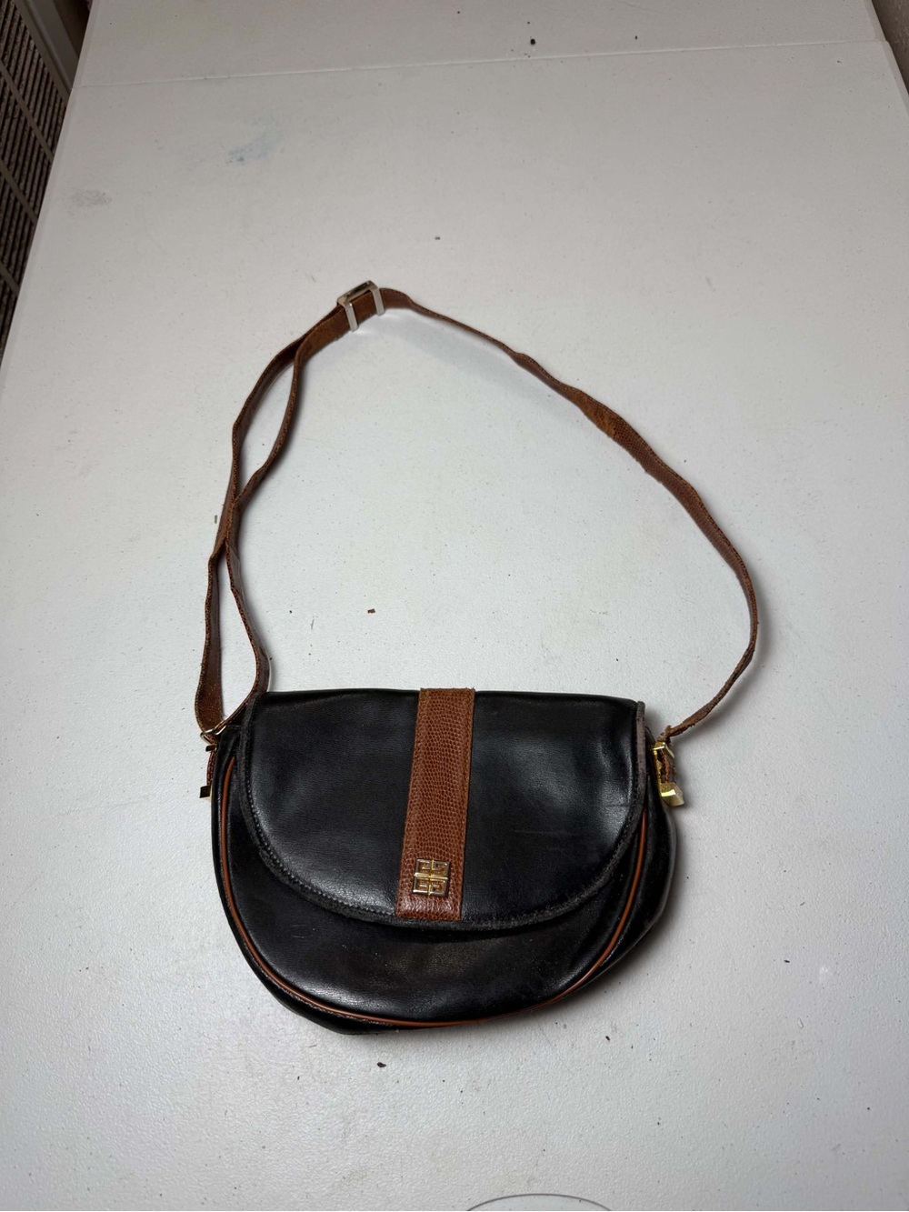 vintage Givenchy Black Leather Crossbody Bag featuring smooth black leather
